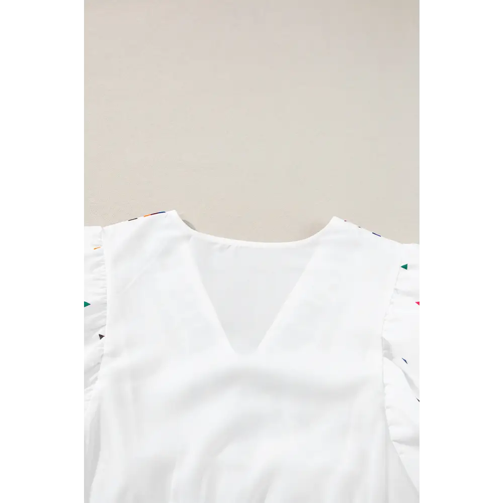 Chic White Babydoll Blouse with Colorful Geometric Print and V-Neck - Perfect for Casual or Dressy Occasions - Blouses