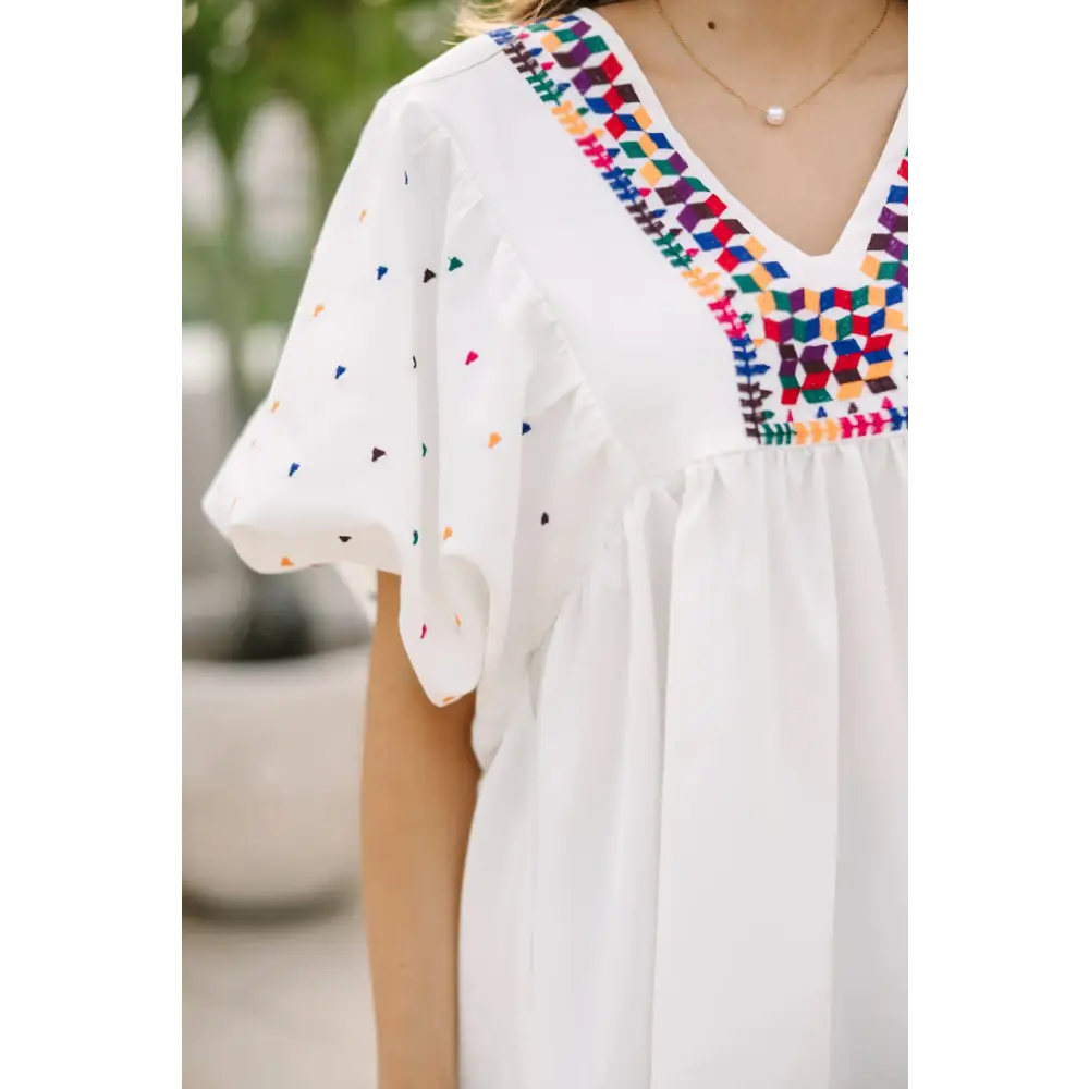 Chic White Babydoll Blouse with Colorful Geometric Print and V-Neck - Perfect for Casual or Dressy Occasions - Blouses