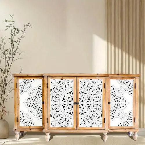 Wooden cabinet with carved white doors.