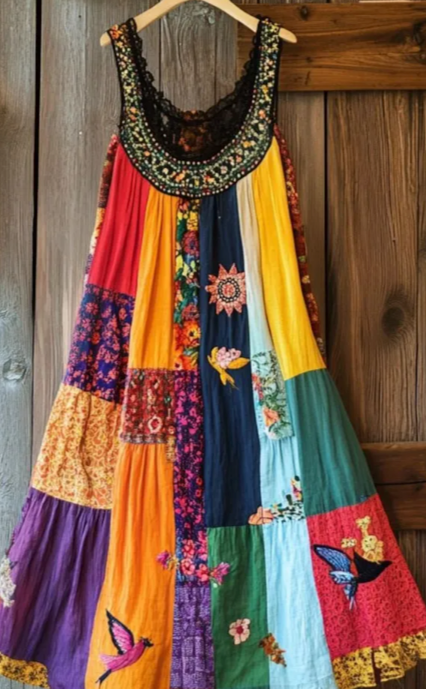 Vintage bohemian patchwork dress with floral embroidery and flowy silhouette